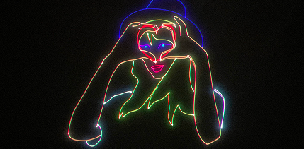 Laser Show of Taylor Swift making a heart with her hands