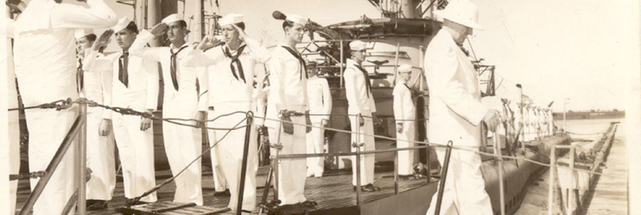 Sailors aboard the USS Requin (SS 481) submarine