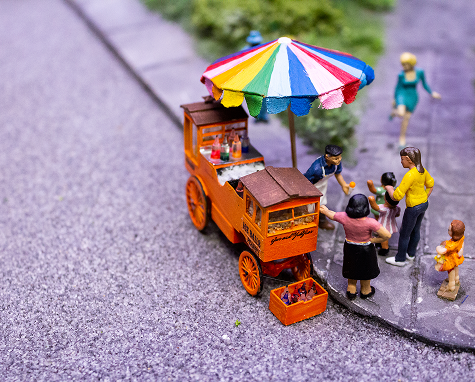 Gus and Yiayia's Ice Ball Cart model situated in the Miniature Railroad & Village exhibit.