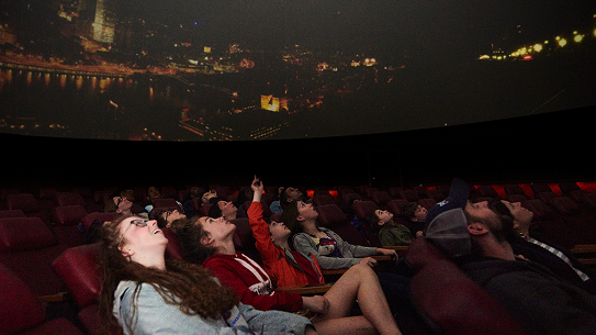 Girls watching a Buhl Planetarium show.