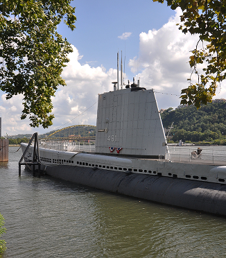 The USS Requin submarine on the river.