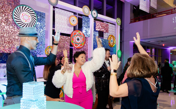 People dancing and having a great time at a party