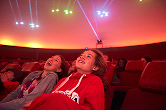 Guests sitting in the Buhl Planetarium