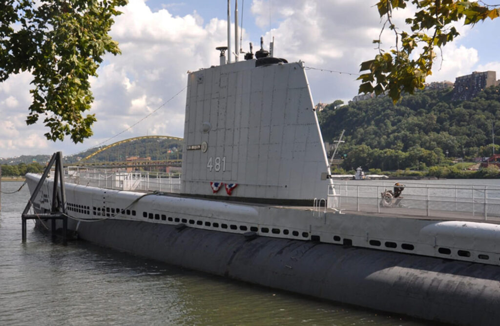 The USS Requin submarine on the river.